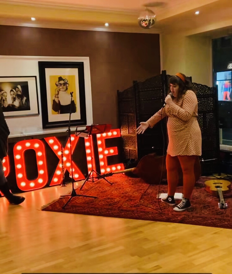 Polona Performing at Shes A Rainbow an art lounge event